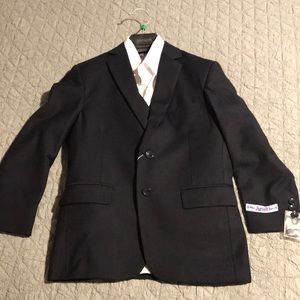 Suit size 8 for kids. NEVER WEAR.